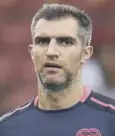  ??  ?? 0 Aaron Hughes: ‘Top pro’.