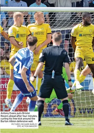  ?? PICTURES: RICHARD BURLEY, EPIC ACTION IMAGERY. ?? Antony Evans puts Bristol Rovers ahead after four minutes, curling his free kick around the Burton Albion defensive wall.