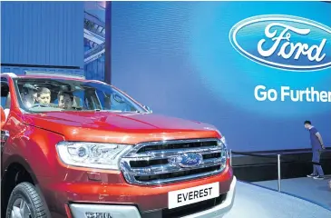  ?? WICHAN CHAROENKIA­TPAKUL ?? A Ford Everest on display at the 36th Bangkok Internatio­nal Motor show. The company sold 7,450 vehicles in January and February, a 38.7% increase year-on-year.