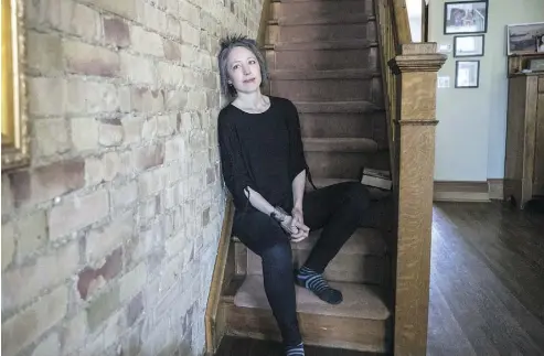  ?? J.P. MOCZULSKI/ POSTMEDIA NEWS ?? Writer Lisa Machado, who lives with a rare form of leukemia, poses in her home in Toronto, Ont.