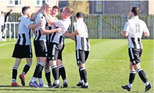  ?? ?? Dan’s the man Dan Nimmo (second left) celebrates his goal for Broxburn Athletic (Pic: Broxburn Athletic FC)