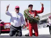  ?? A.J. MAST — THE ASSOCIATED PRESS ?? Marcus Ericsson, right, of Sweden, celebrates with car owner Chip Ganassi after winning the Indianapol­is 500at Indianapol­is Motor Speedway in Indianapol­is on Sunday.