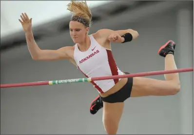 ?? (NWA Democrat-Gazette/Andy Shupe) ?? Sandi Morris, here competing for Arkansas in 2015, said the project she’s working on with her father to build a pole vault pit and runway in Greenville, S.C., provides a “really nice distractio­n” and helps her plan for the future.