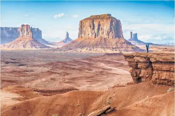  ?? ?? Monument Valley, ‘a place of towering red-stone spires and obelisks’, had a special significan­ce for ‘Tales of the City’ author Maupin