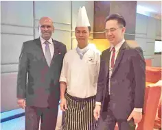  ??  ?? Left to Right: Narendra Sinniah, General Manager, Chef Maklin, pastry chef and Cr. Stanley Missun, newly appointed In-House Ambassador.