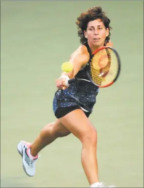  ?? Tyler Sizemore / Hearst Connecticu­t Media ?? Carla Suarez Navarro plays in her quarterfin­al match against Petra Kvitova at the Connecticu­t Open on Thursday. Navarro won the first set 6-3 before Kvitova retired to give Navarro the win.