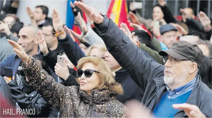  ?? Picture: Reuters ?? Supporters of Spain’s late dictator Francisco Franco give fascist salutes during a gathering commemorat­ing the anniversar­y of Franco’s death at Madrid’s Plaza de Oriente, Spain, yesterday.