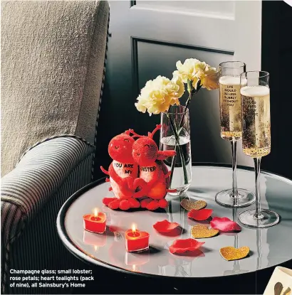  ??  ?? Champagne glass; small lobster; rose petals; heart tealights (pack of nine), all Sainsbury’s Home