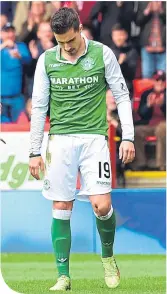  ??  ?? Hibernian’s Jamie Maclaren shows his dejection after missing a penalty