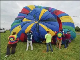  ?? PETE BANNAN — DIGITAL FIRST MEDIA ?? Crews from Air Ventures inflated their balloon during the 12th Annual Chester County Balloon Festival.