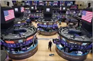  ??  ?? The virus has emptied the NYSE trading floor.