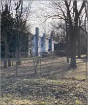  ?? MITCH HOTTS — THE MACOMB DAILY ?? The entire two-story structure on Millar Road across the street from Ottawa Elementary School is enclosed by a chain-link fence.