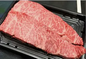  ??  ?? Wagyu has a high fat-to-meat ratio, which creates a beautiful marbling like this.