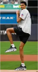  ?? JOHN MINCHILLO/ASSOCIATED PRESS ?? NBA prospect Victor Wembanyama threw out the first pitch at Yankee Stadium.