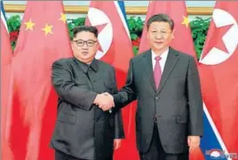  ?? AP FILE ?? Xi Jinping (right) told Kim Jong Un he “actively supports” North Korea’s reform and openingup.