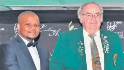  ??  ?? Old Mutual Corporate General Manager Malusi Ndlovu with Lifetime Achiever Award winner Roger Porter