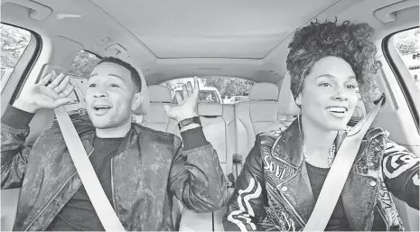  ?? PHOTOS BY CBS ?? Music-star friends John Legend and Alicia Keys take to song and the streets in Apple Music’s Carpool Karaoke: The Series.