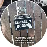  ?? ?? WARNING Sign on gate where a dog attacked a woman