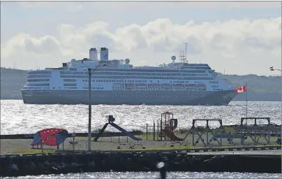  ?? JULIE COLLINS/CAPE BRETON POST ?? The Holland America cruise ship Rodderdam passes by Indian Beach in North Sydney Tuesday on her way to Sydney with 1,404 passengers and a crew of 600. A higher than expected passenger tax related to the cruise ships that call at the port is one of the...