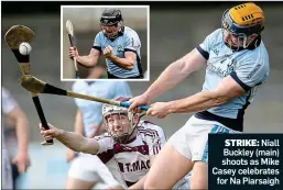  ??  ?? STRIKE: Niall Buckley (main) shoots as Mike Casey celebrates for Na Piarsaigh