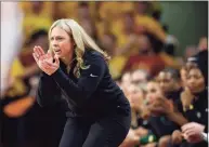  ?? Matthew Putney / Associated Press ?? Baylor coach Nicki Collen encourages the team during the second half against Iowa State on Feb. 28.