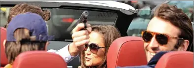  ??  ?? Gun drama: With Pippa in the front seat, the driver of the car produces a pistol from the glove box