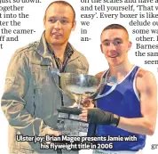  ??  ?? Ulster joy: Brian Magee presents Jamie with
his flyweight title in 2006