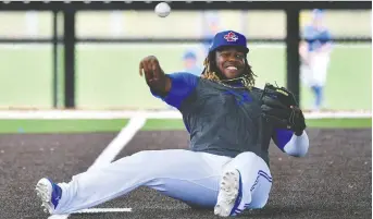  ?? DOUGLAS DEFELICE/ USA TODAY SPORTS FILES ?? Vladimir Guerrero Jr. isn't sitting down on the job this off-season. He's playing winter-league ball in the Dominican Republic in a bid to win back the job at third base with the Jays.