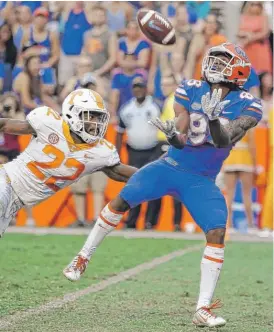  ?? | AP ?? Florida receiver Tyrie Cleveland catches the game- winning 63- yard touchdown pass.