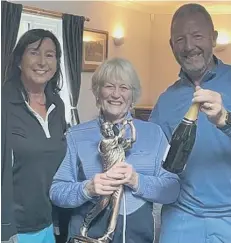  ??  ?? Roz Upton (centre) with Kim and Nick Markillie at Gedney Hill Golf Club.