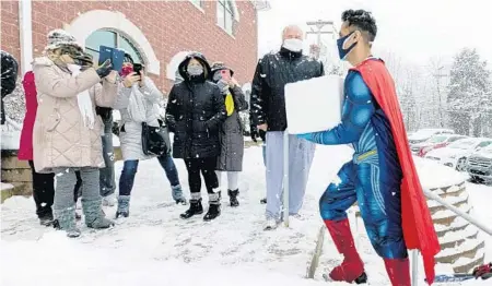  ?? CHORUS PHOTOGRAPH­Y ?? Pharmacist Mayank Amin wears a superhero costume as he arrives Feb. 7 with vials of vaccine at a clinic in Skippack Township, Pa.