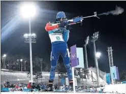  ??  ?? PRECISO. Martín Fourcade en un momento de la prueba de tiro.