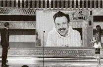  ?? Christophe­r Polk / NBCU Photo Bank via Getty Images ?? Via video, Jason Sudeikis accepts the Golden Globe for best actor in a TV musical or comedy series for his turn in “Ted Lasso.”