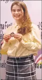  ?? ?? Clodagh Barrett, Knockadea, a participan­t in the Musical Theatre (12-15), with her medal.