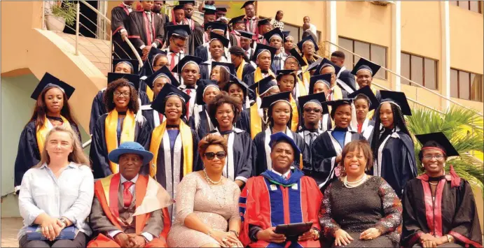  ??  ?? Graduating students from Global Internatio­nal College, Lagos, pose with guests ...recently