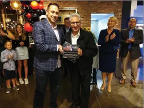  ?? MELISSA SCHUMAN - MEDIANEWS GROUP ?? Old Brick Furniture owner Mike Fiacco receives the Senate Empire Award from Senator Jim Tedisco.