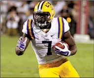  ?? AP/ JIM LYTLE ?? LSU running back Leonard Fournette had a tough time getting anything going against Alabama last Saturday, but the sophomore still leads the nation with 172.9 rushing yards per game.