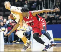  ?? ST. JOHN’S EDGE PHOTO/JEFF PARSONS ?? St. John’s Edge guard Carl English (left) is shown in action against Shaquille Keith of the Windsor Express during their National Basketball League of Canada game at Mile One Center.