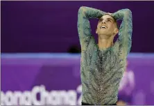  ?? ASSOCIATED PRESS FILE PHOTO ?? Adam Rippon of the United States reacts following his performanc­e in the men’s free figure skating final in the Gangneung Ice Arena at the 2018 Winter Olympics in Gangneung, South Korea, Saturday, Feb. 17, 2018. Rippon, who came out publicly in October 2015, was the first openly gay athlete to represent the United States in Olympic competitio­n.