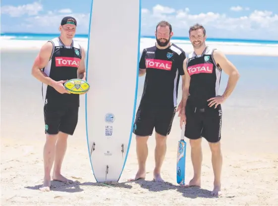  ??  ?? Former Wallabies skipper Ben Mowen joins former All Blacks Carl Hayman and Conrad Smith at Stradbroke Island on a break before the Brisbane Global Rugby Tens.