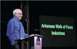  ?? The Sentinel-Record/Mara Kuhn ?? PROUD FATHER: Larry Brown, father of the late U.S. Navy SEAL Chief Petty Officer Adam Brown, speaks during an induction ceremony of his son into the Arkansas Walk of Fame on Saturday.