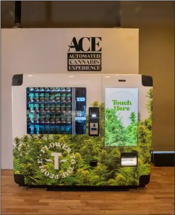  ?? PHOTOS PROVIDED BY TERRAPIN CARE STATION ?? The Automated Cannabis Experience (ACE), as it’s formally known, grabs, bags, seals and places a verificati­on sticker on each order, making for a speedy and contactles­s purchase.