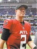  ?? AP ?? Matt Ryan heads off field after dominant performanc­e against Jets Sunday in London.