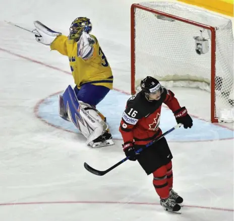  ?? MARTIN MEISSNER/THE ASSOCIATED PRESS ?? Swedish goalie Henrik Lundqvist celebrates after Canada’s Mitch Marner fails to score in a shootout at the world hockey championsh­ip on Sunday.