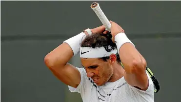  ?? PHOTO: REUTERS ?? Rafael Nadal reacts after losing his match to Luxembourg’s Gilles Muller.