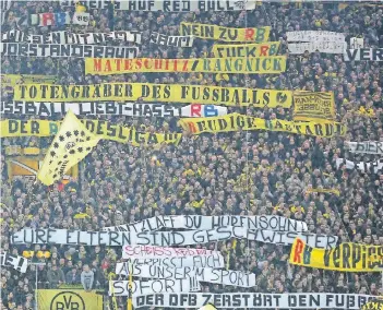  ?? FOTO: DPA ?? Kundgebung auf der Dortmunder Südtribüne gegen RB Leipzig.