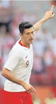  ?? REUTERS ?? Poland forward Robert Lewandowsk­i celebrates his goal.