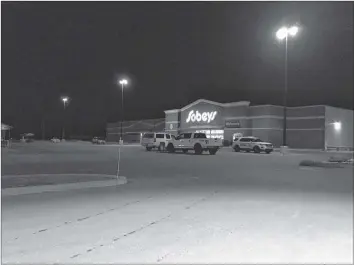  ?? ASHLEY THOMPSON ?? Police vehicles could be seen in the parking lot of Sobeys in Greenwood following an armed robbery that occurred shortly after 8 p.m. March 21.