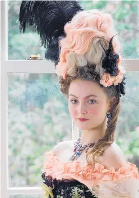  ?? ?? Georgia Wilson, 17, models a Bridgerton hairstyle created by senior hairdresse­r Angela Enoka.