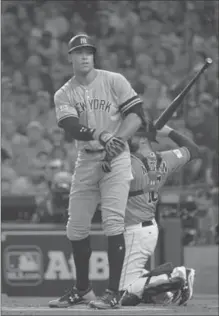  ?? HOWARD SIMMONS, TNS ?? The New York Yankees’ Aaron Judge draws a first-inning walk against the Houston Astros in Game 1 of the American League Championsh­ip Series at Minute Maid Park in Houston on Friday.